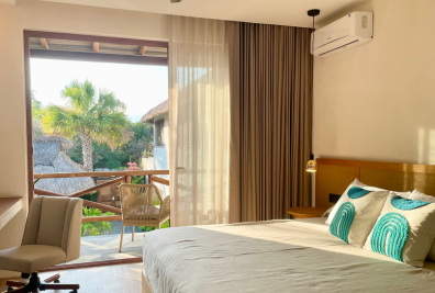 habitacion-estandar-cama-queen-vista-piscina-bidmont-villa