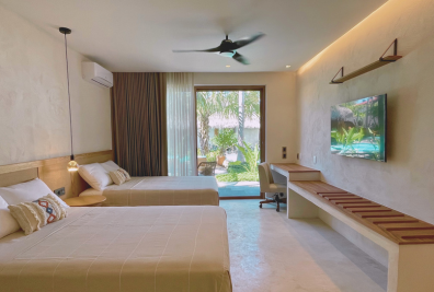 habitacion-suite-cocineta-cama-doble-vista-piscina-bidmont-villa