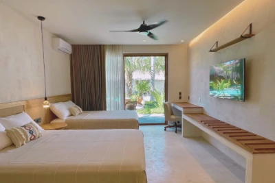 habitacion-suite-cocineta-cama-doble-vista-piscina-bidmont-villa