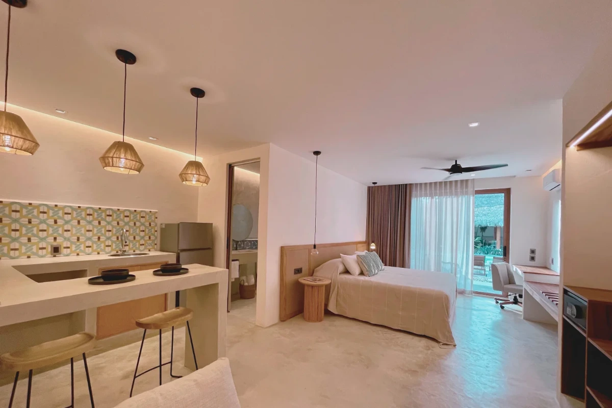 habitacion-suite-cocineta-vista-piscina-bidmont-villapopup